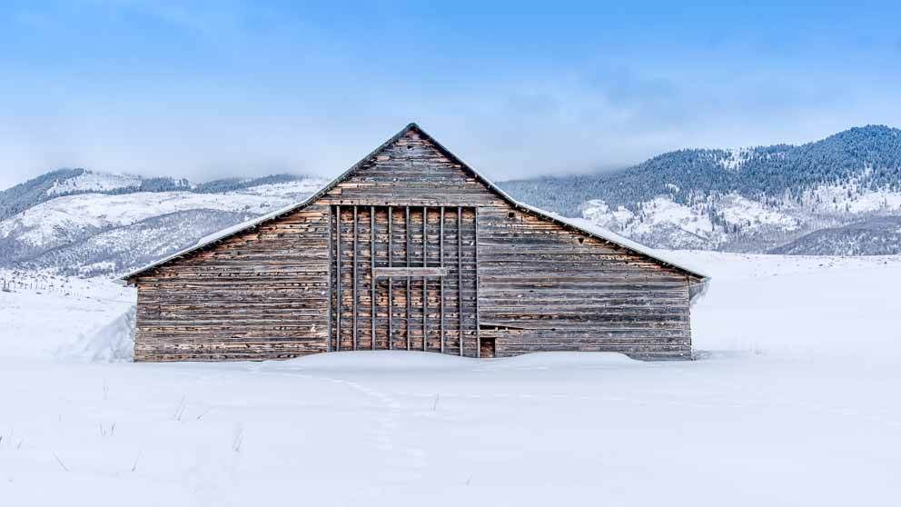 Barn in winter shows its Aged Beauty by Mark Ruckman